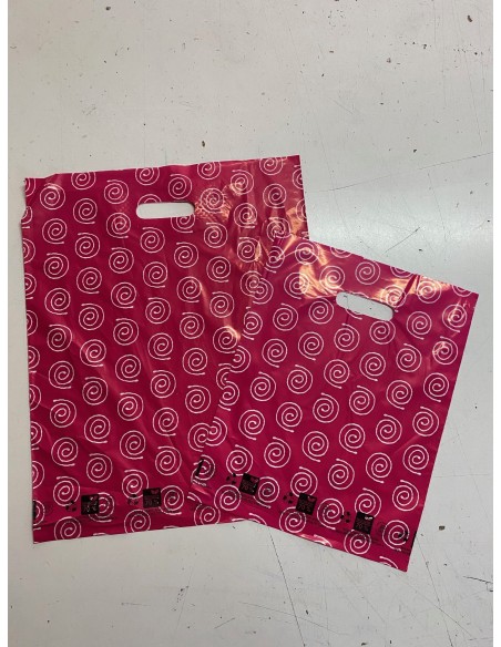 Bolsa Asa Troquel 70% RECICLADO, Impresa en Color Rosa de 40 x 50 cms